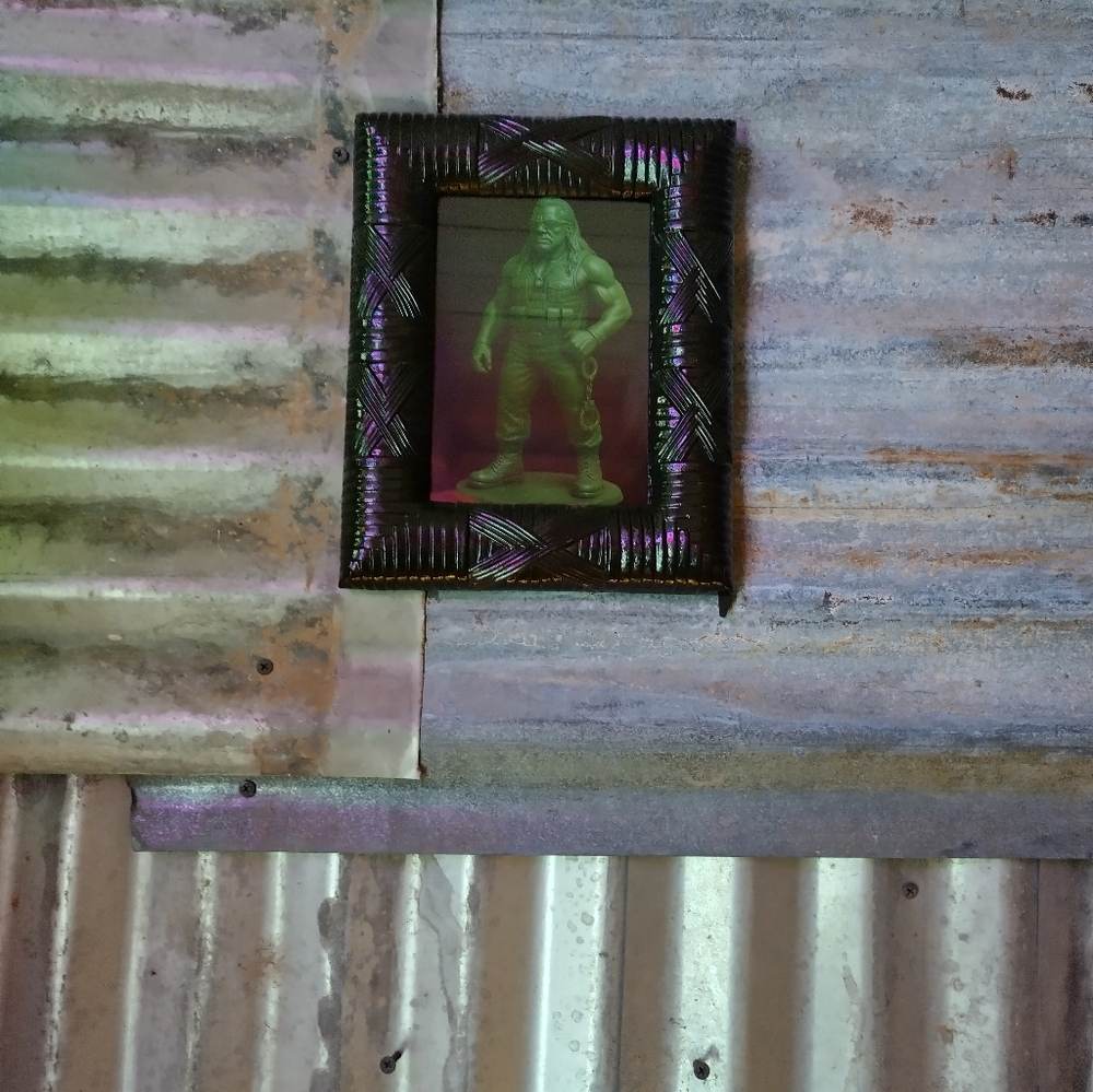 Dog The Bounty Hunter Plastic Army Man Framed Art Print By Neon Nicho